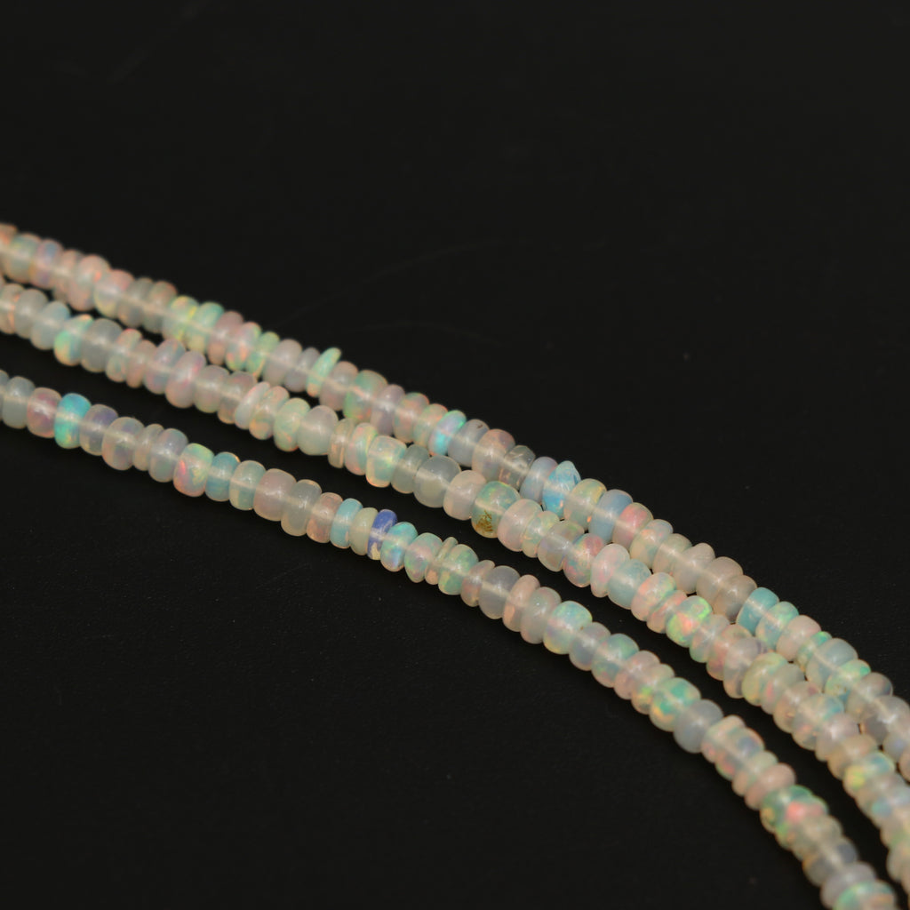 Natural White Ethiopian Opal Smooth Roundel Beads 3 mm to 3.5 mm, Ethiopian Opal Beads, Gem Quality , 16 Inch Full Strand, Price Per Strand - National Facets, Gemstone Manufacturer, Natural Gemstones, Gemstone Beads, Gemstone Carvings