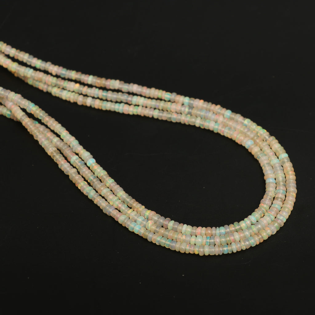 Natural Golden Ethiopian Opal Smooth Roundel Beads 2.5 mm to 3.5 mm, Ethiopian Opal Beads, Gem Quality, 16 Inch Full Strand,Price Per Strand - National Facets, Gemstone Manufacturer, Natural Gemstones, Gemstone Beads, Gemstone Carvings