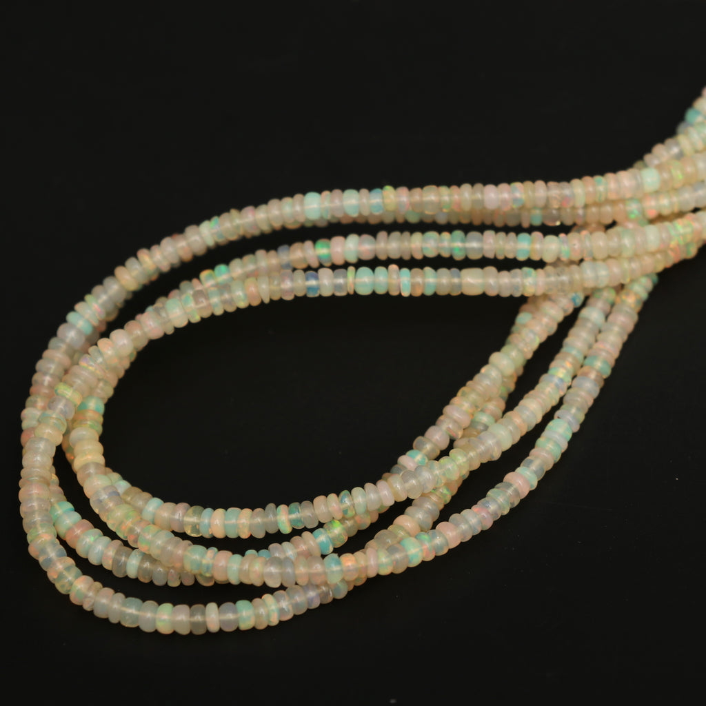 Natural Golden Ethiopian Opal Smooth Roundel Beads 2.5 mm to 3.5 mm, Ethiopian Opal Beads, Gem Quality, 16 Inch Full Strand,Price Per Strand - National Facets, Gemstone Manufacturer, Natural Gemstones, Gemstone Beads, Gemstone Carvings