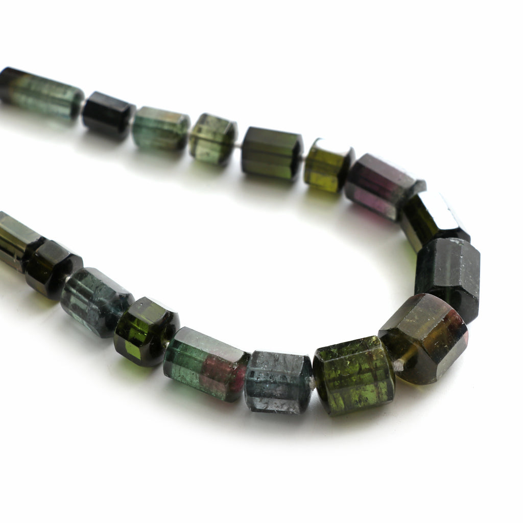 Tourmaline Faceted Cylinder Beads, 4.5x8.5mm To 12.5x14.5mm , Tourmaline Tube Strand, 17 Inches Full Strand, Price Per Strand - National Facets, Gemstone Manufacturer, Natural Gemstones, Gemstone Beads, Gemstone Carvings