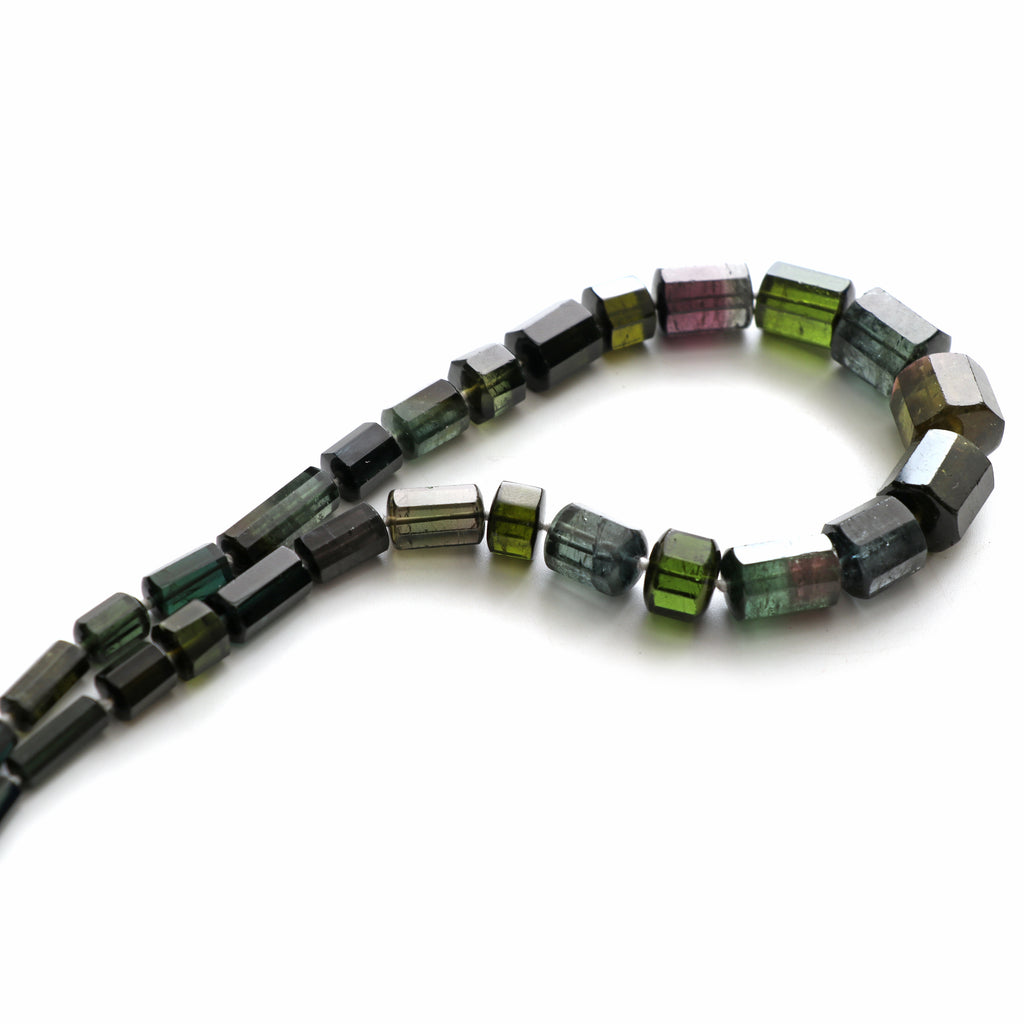 Tourmaline Faceted Cylinder Beads, 4.5x8.5mm To 12.5x14.5mm , Tourmaline Tube Strand, 17 Inches Full Strand, Price Per Strand - National Facets, Gemstone Manufacturer, Natural Gemstones, Gemstone Beads, Gemstone Carvings