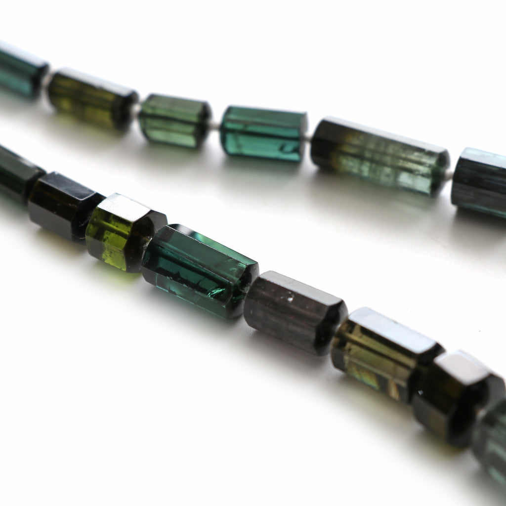 Tourmaline Faceted Cylinder Beads, 4.5x8.5mm To 12.5x14.5mm , Tourmaline Tube Strand, 17 Inches Full Strand, Price Per Strand - National Facets, Gemstone Manufacturer, Natural Gemstones, Gemstone Beads, Gemstone Carvings