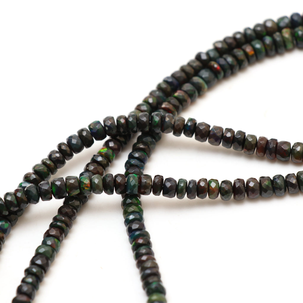 Dyed Black Ethiopian Opal Faceted Rondelle Beads, 5.5 mm to 8 mm, Opal Jewelry Handmade Gift for Women, 18 Inches Strand, Price Per Strand - National Facets, Gemstone Manufacturer, Natural Gemstones, Gemstone Beads, Gemstone Carvings