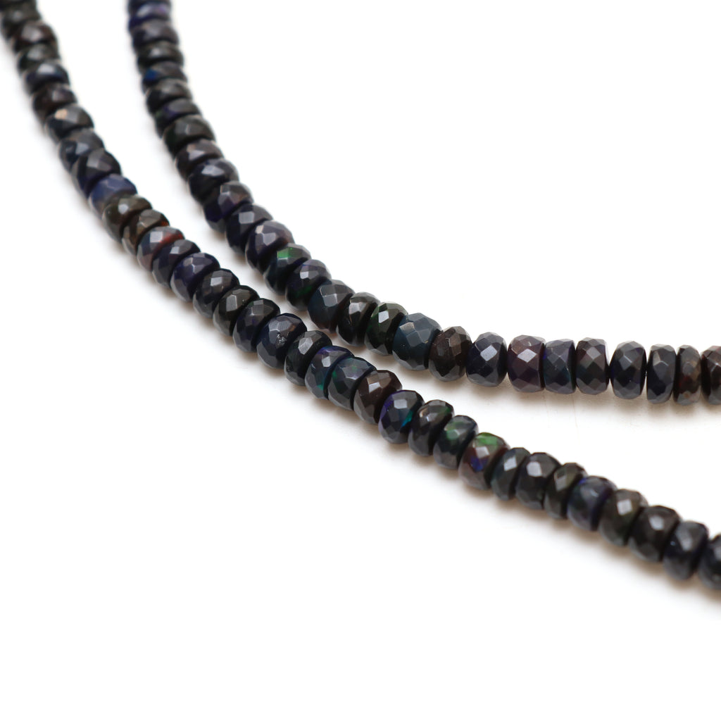 Dyed Black Ethiopian Opal Faceted Rondelle Beads, 6 mm to 8 mm, Opal Jewelry Handmade Gift for Women, 18 Inches Strand, Price Per Strand - National Facets, Gemstone Manufacturer, Natural Gemstones, Gemstone Beads, Gemstone Carvings