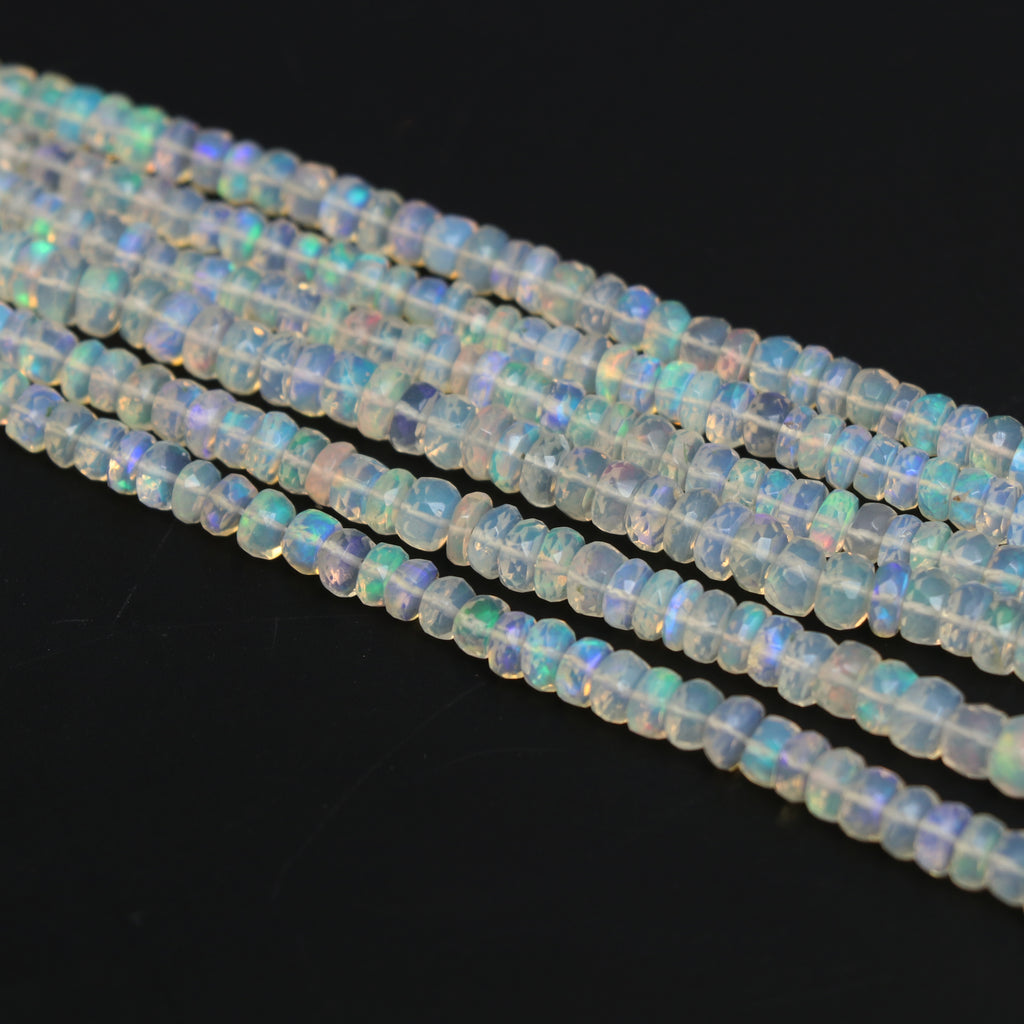 Natural Ethiopian Opal Faceted Rondelle Beads, 4 mm to 6 mm, Opal Jewelry Handmade Gift for Women, 19 Inch Strand, Price Per Strand - National Facets, Gemstone Manufacturer, Natural Gemstones, Gemstone Beads, Gemstone Carvings