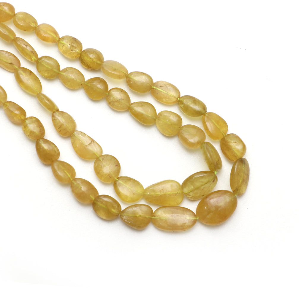 Yellow Tourmaline Smooth Tumble Beads, 5x6 mm to 8x10 mm, Tourmaline Jewelry Gift For Women, 18 Inch Full Strand, Price Per Strand - National Facets, Gemstone Manufacturer, Natural Gemstones, Gemstone Beads, Gemstone Carvings