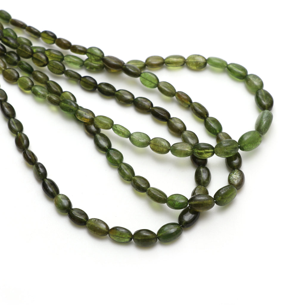 Chrome Tourmaline Smooth Tumble Beads, 5x6 mm to 6.5x9 mm, Chrome Tourmaline Jewelry, 18 Inches Full Strand, Price Per Strand - National Facets, Gemstone Manufacturer, Natural Gemstones, Gemstone Beads, Gemstone Carvings