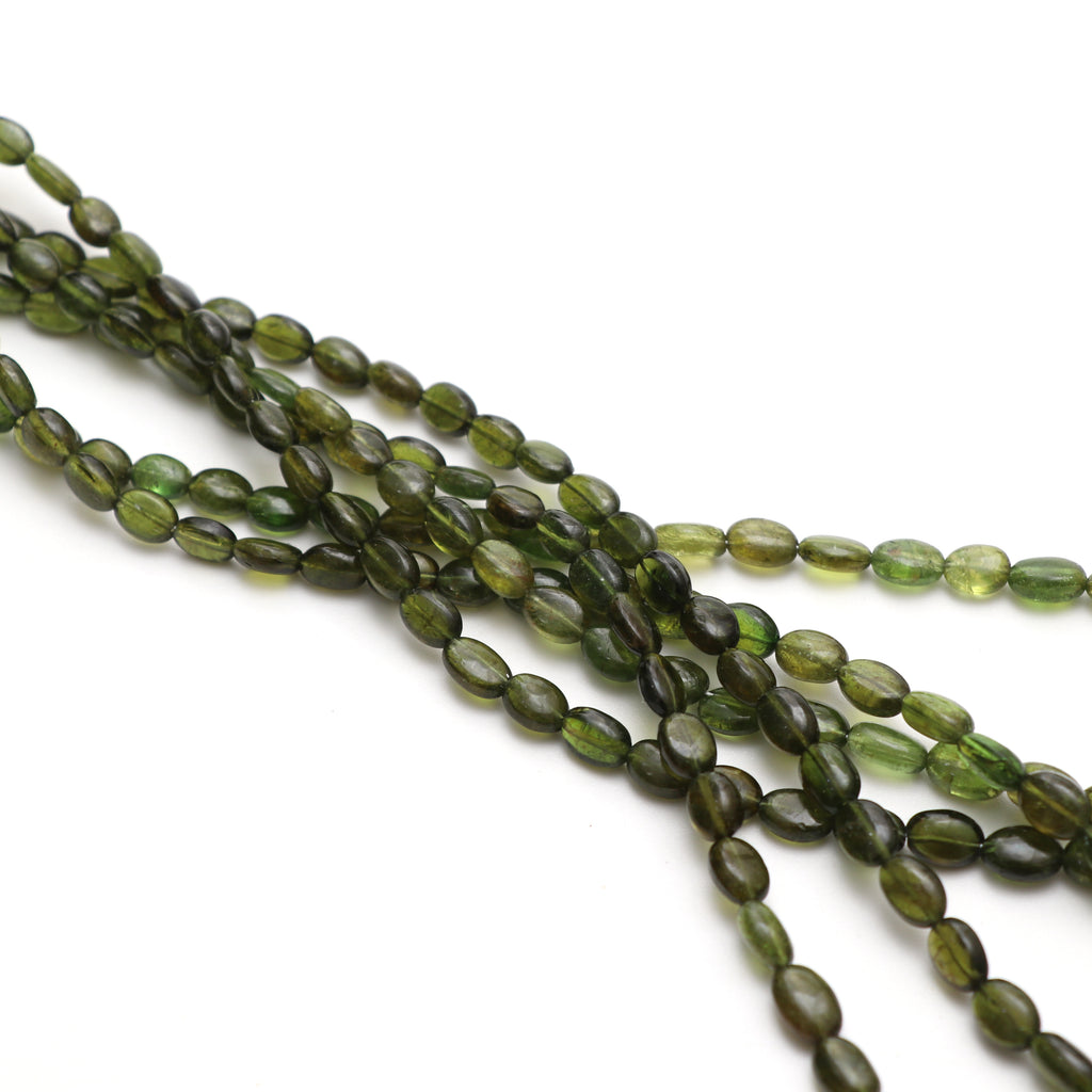 Chrome Tourmaline Smooth Tumble Beads, 5x6 mm to 6.5x9 mm, Chrome Tourmaline Jewelry, 18 Inches Full Strand, Price Per Strand - National Facets, Gemstone Manufacturer, Natural Gemstones, Gemstone Beads, Gemstone Carvings