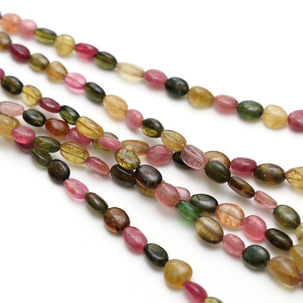 Multi Tourmaline Smooth Tumble Beads, 5x5 mm to 7.5x13 mm, Tourmaline Jewelry Making Beads, 18 Inch Full Strand, Price Per Strand - National Facets, Gemstone Manufacturer, Natural Gemstones, Gemstone Beads, Gemstone Carvings