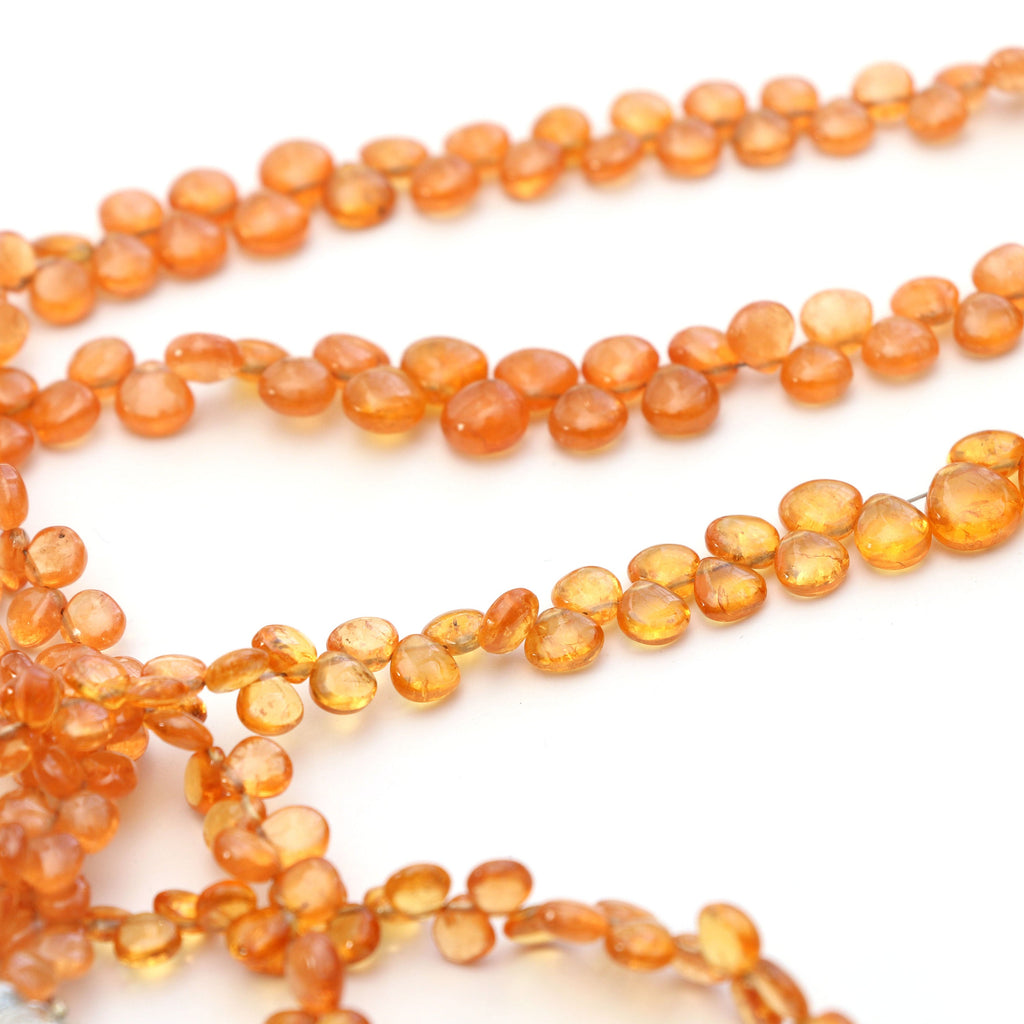 Spessartite Smooth Heart Beads- 4.5mm to 7.5mm Spessartite Heart Beads - Gem Quality, 8 Inch/16 Inch Full Strand, Price Per Strand - National Facets, Gemstone Manufacturer, Natural Gemstones, Gemstone Beads