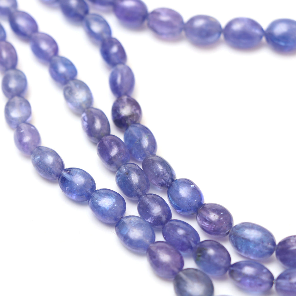 Natural Tanzanite Smooth Tumble Beads | 5x6 mm to 8x11 mm | Tanzanite Tumble Gemstone | 8 Inch/ 18 Inch Full Strand | Price Per Strand - National Facets, Gemstone Manufacturer, Natural Gemstones, Gemstone Beads