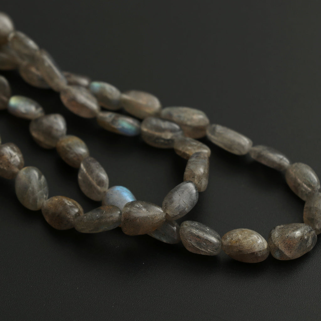 Labradorite Smooth Tumble Nuggets Beads, 4.5x6.5 mm to 6x10.5 mm, Labradorite Strand, 8 Inch / 16 Inch Full Strand, Price Per Strand - National Facets, Gemstone Manufacturer, Natural Gemstones, Gemstone Beads