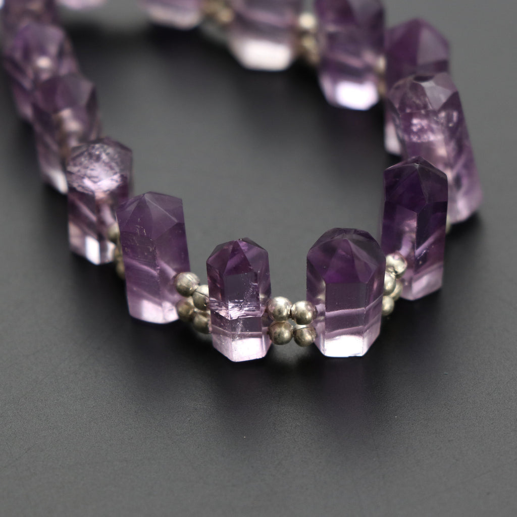 Amethyst Faceted Cut Gemstone Bullet Beads, 5x9 mm to 6x16 mm, Amethyst Bullet Point, Amethyst Cut, 8 Inch, Price Per Strand - National Facets, Gemstone Manufacturer, Natural Gemstones, Gemstone Beads