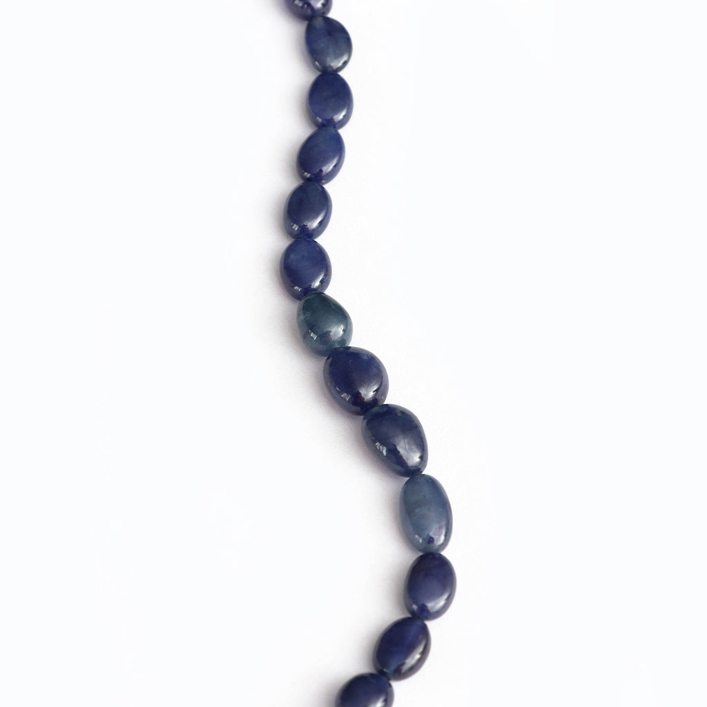 Blue Sapphire Smooth Tumble Beads - 7x9 mm to 9x12 mm - Blue Sapphire Gemstone - Gem Quality , 18 Cm Full Strand, Price Per Strand - National Facets, Gemstone Manufacturer, Natural Gemstones, Gemstone Beads