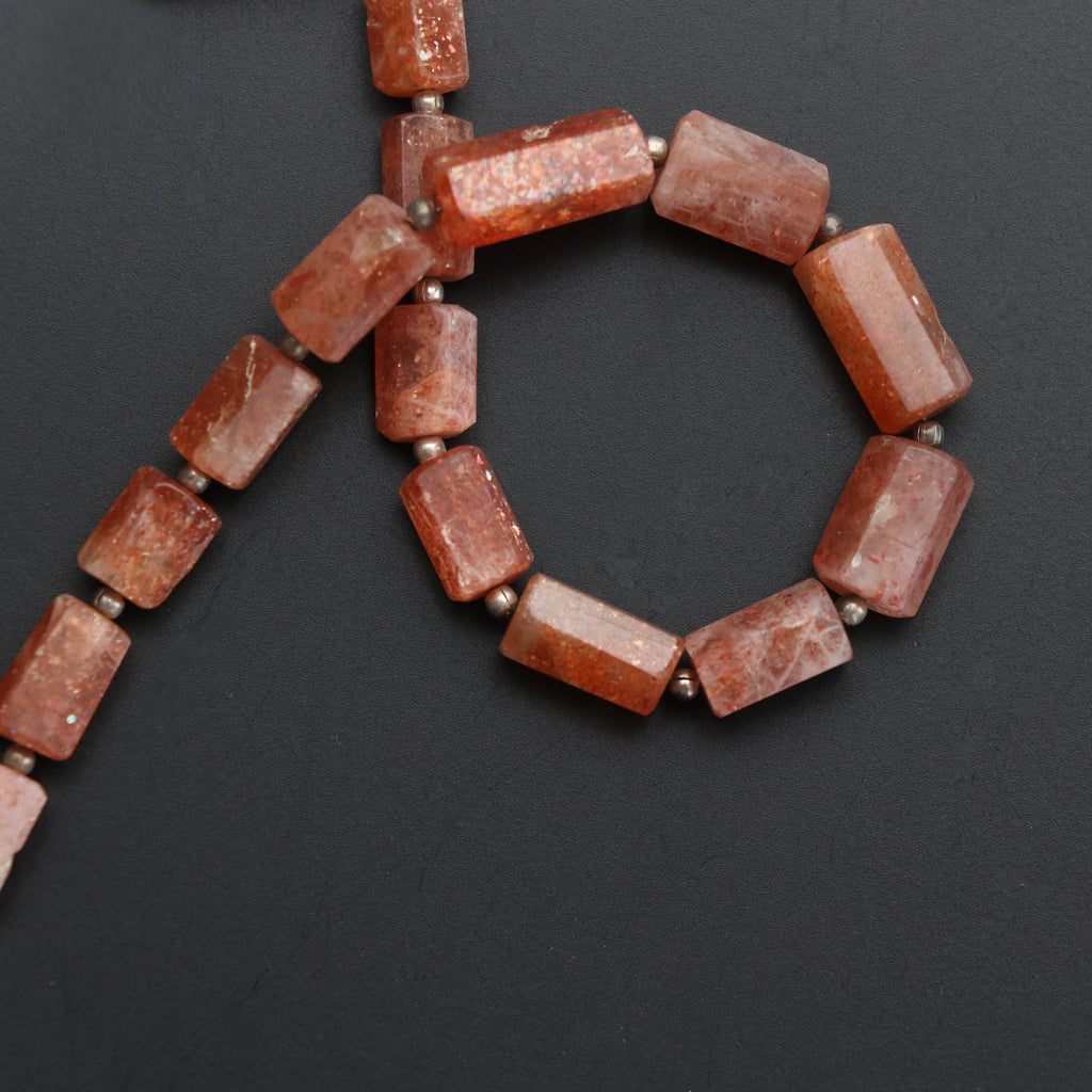 Sunstone Faceted Beads Cylinder, Sunstone Faceted - 7x5 mm to 14x8 mm -Sunstone Cylinder - Gem Quality, 8 Inch, Price Per Strand - National Facets, Gemstone Manufacturer, Natural Gemstones, Gemstone Beads