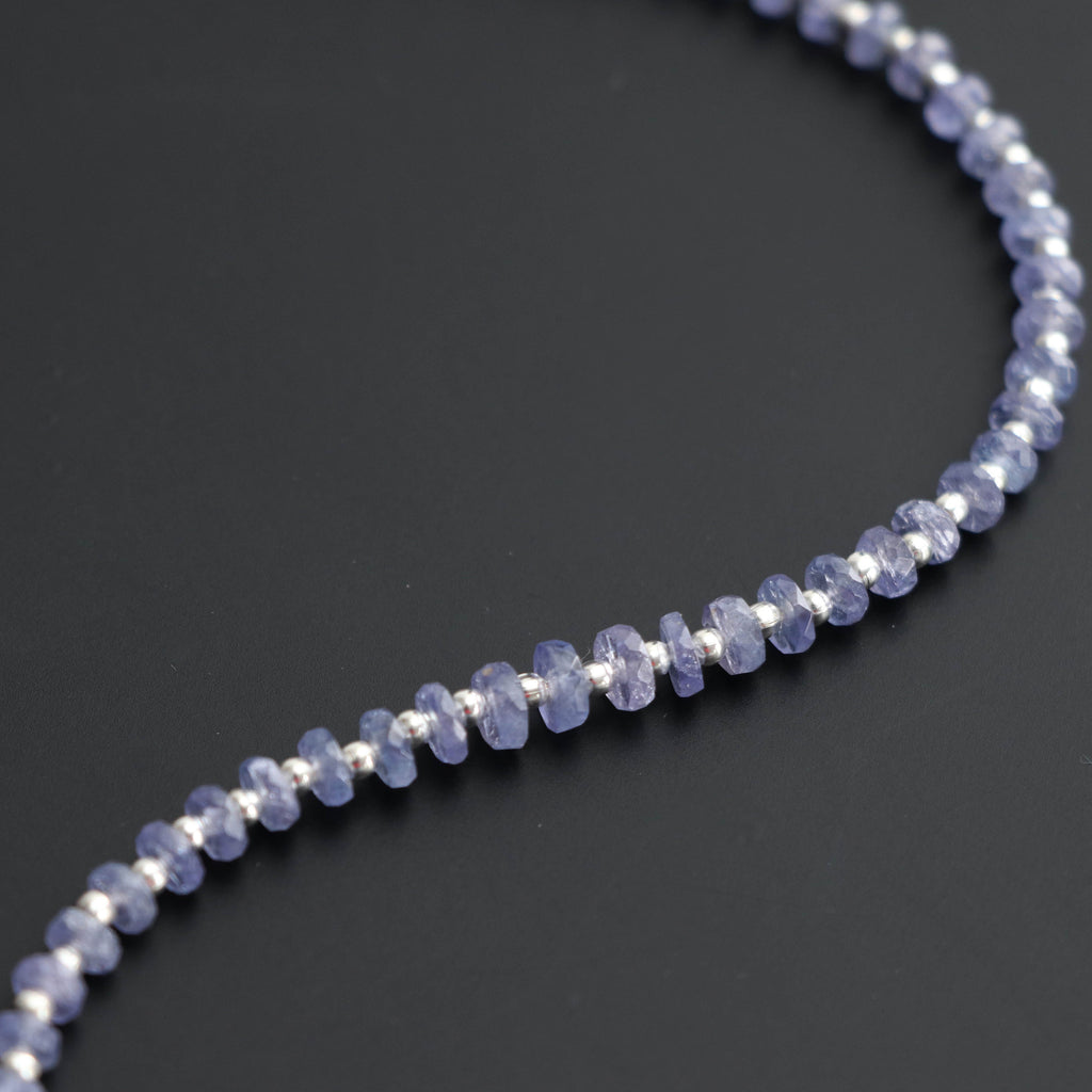 Tanzanite Faceted Tyre beads, 4 mm to 5 mm, Tanzanite strand, Gift for Women ,8 Inch / 16 Inch Full Strand, Per Strand Price - National Facets, Gemstone Manufacturer, Natural Gemstones, Gemstone Beads