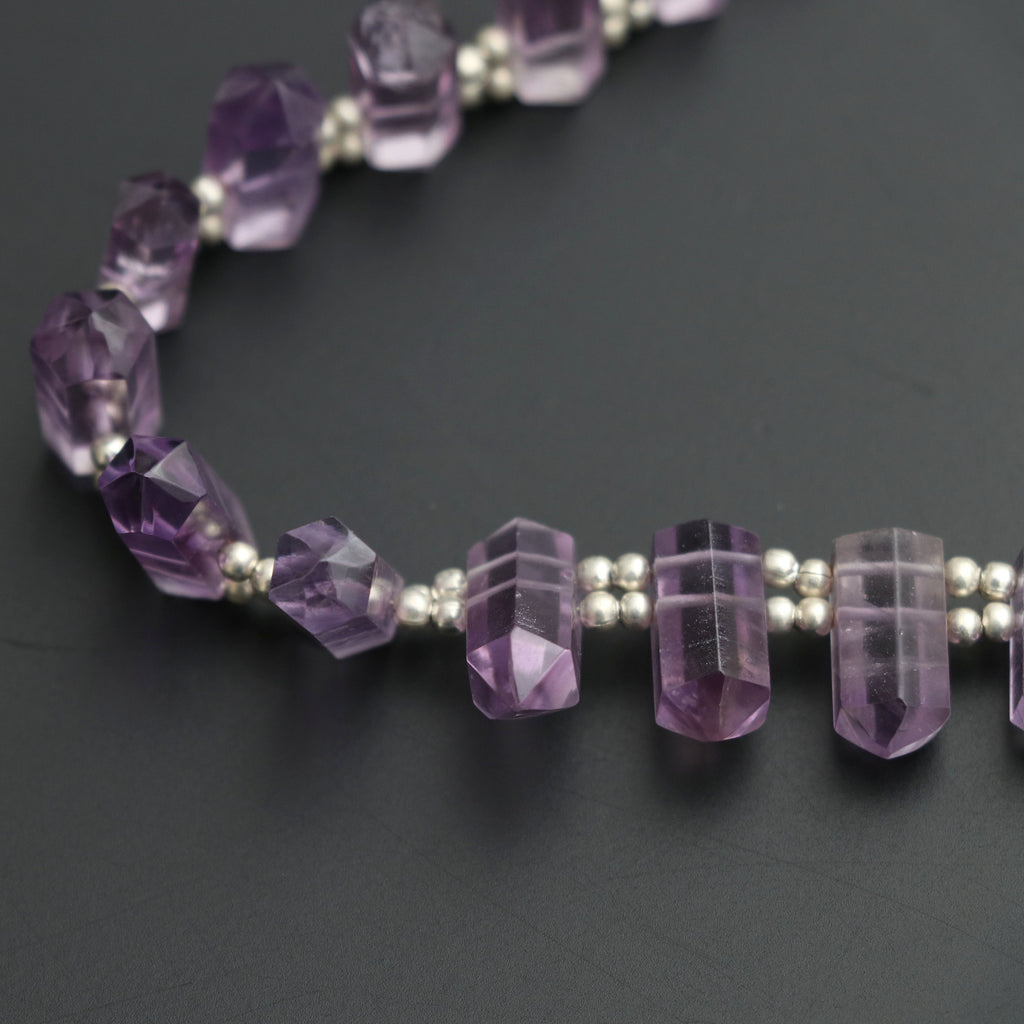 Amethyst Faceted Cut Gemstone Bullet Beads, 5x9 mm to 6x16 mm, Amethyst Bullet Point, Amethyst Cut, 8 Inch, Price Per Strand - National Facets, Gemstone Manufacturer, Natural Gemstones, Gemstone Beads