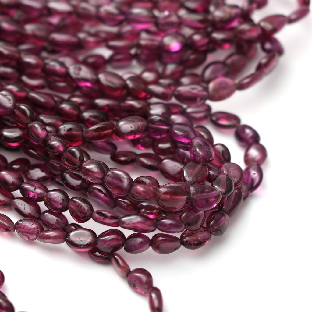 Garnet Smooth Oval Beads, 4x3 mm to 6x5 mm, Garnet Oval Beads - Gem Quality , 18 Inch/ 46 Cm Full Strand, Price Per Strand - National Facets, Gemstone Manufacturer, Natural Gemstones, Gemstone Beads