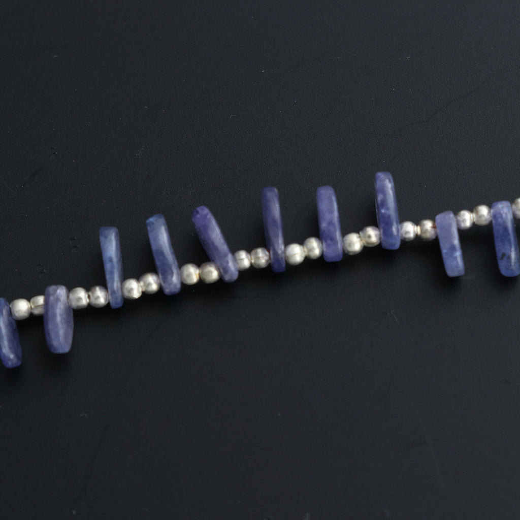 Natural Tanzanite Smooth Flat Oval Beads - 5x6 mm to 7x9 mm- Tanzanite Oval Cabs Gemstone- Gem Quality , 20 Cm Full Strand, Price Per Strand - National Facets, Gemstone Manufacturer, Natural Gemstones, Gemstone Beads