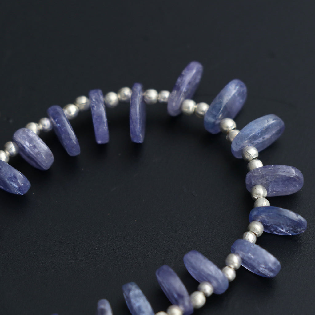 Natural Tanzanite Smooth Flat Oval Beads - 5x6 mm to 7x9 mm- Tanzanite Oval Cabs Gemstone- Gem Quality , 20 Cm Full Strand, Price Per Strand - National Facets, Gemstone Manufacturer, Natural Gemstones, Gemstone Beads