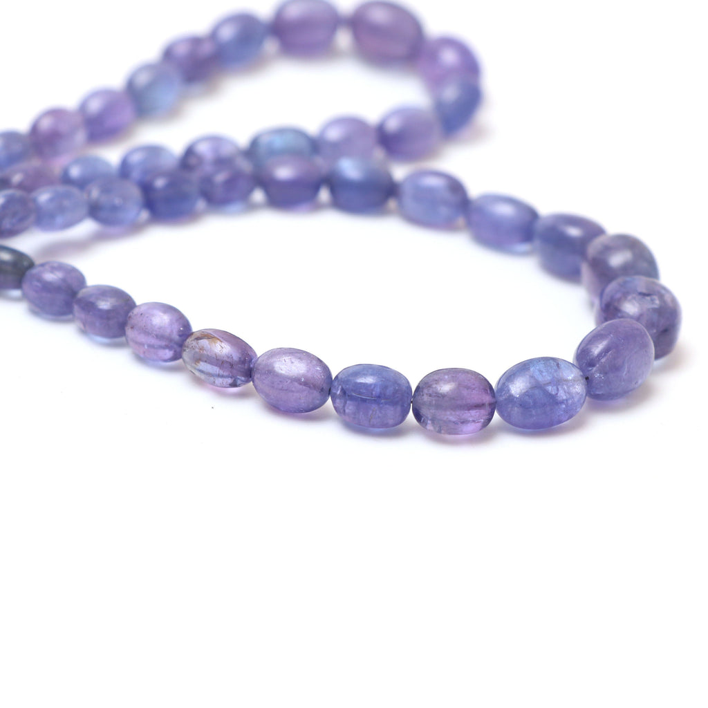 Natural Tanzanite Smooth Tumble Beads | 5x6.5 mm to 9x12 mm | Tanzanite Tumble Gemstone | 8 Inch/ 18 Inch Full Strand | Price Per Strand - National Facets, Gemstone Manufacturer, Natural Gemstones, Gemstone Beads