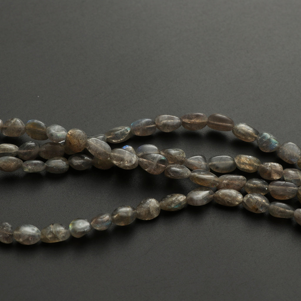Labradorite Smooth Tumble Nuggets Beads, 4.5x6.5 mm to 6x10.5 mm, Labradorite Strand, 8 Inch / 16 Inch Full Strand, Price Per Strand - National Facets, Gemstone Manufacturer, Natural Gemstones, Gemstone Beads