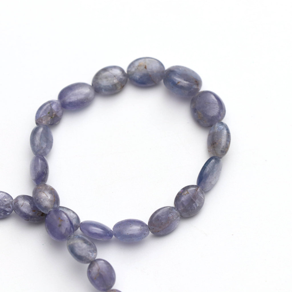 Natural Tanzanite Smooth Oval Beads, Tanzanite Oval, 6x7 mm to 7.5x9 mm - Tanzanite - Gem Quality , 8 Inch Full Strand, Price Per Strand - National Facets, Gemstone Manufacturer, Natural Gemstones, Gemstone Beads