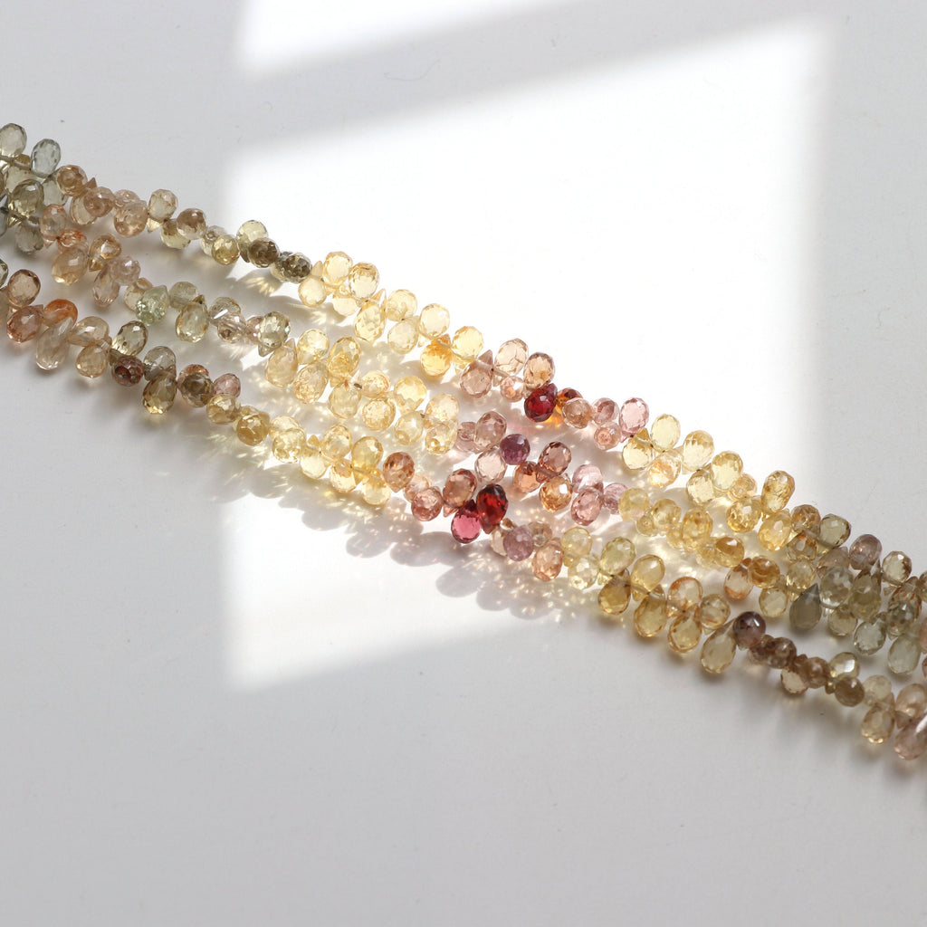 Natural Zircon Faceted Briolette Beads | Zircon Faceted drops | 5x3.5 mm to 6x3.5 mm | 8 Inch/ 16 Inch Full Strand | Price Per Strand - National Facets, Gemstone Manufacturer, Natural Gemstones, Gemstone Beads