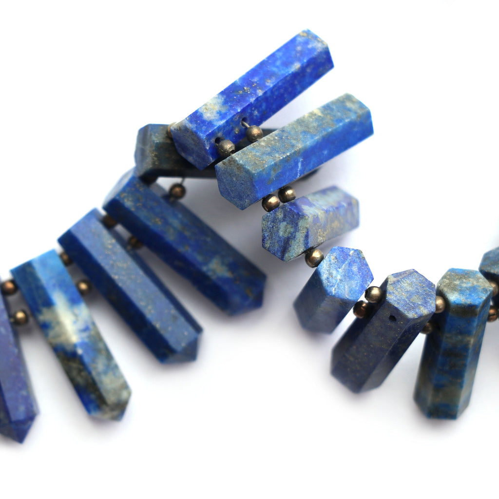 Lazuli Lapis Faceted Cut Gemstone Bullet Beads, 10x6 mm to 24x5 mm,Lazuli Lapis Bullet Point,Lazuli Lapis Cut, 6 Inch, Price Per Strand - National Facets, Gemstone Manufacturer, Natural Gemstones, Gemstone Beads