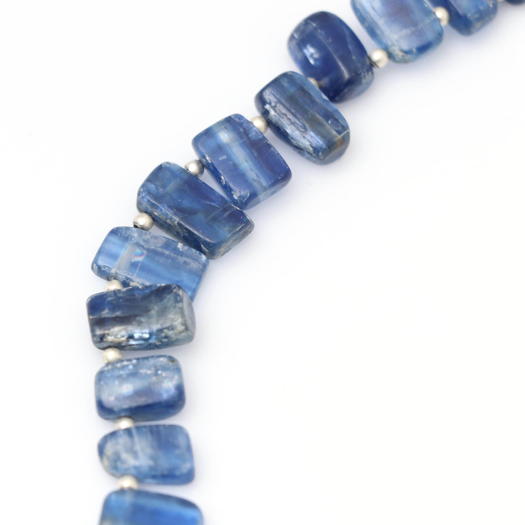 Kyanite Smooth Slice Side Drill Beads , Kyanite Side Drill -8x5 mm to 14x8 mm - Kyanite Smooth Slice -Gem Quality, 8 Inch, Price Per Strand - National Facets, Gemstone Manufacturer, Natural Gemstones, Gemstone Beads