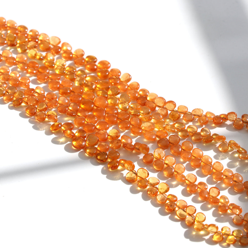 Spessartite Smooth Heart Beads- 4.5mm to 7.5mm Spessartite Heart Beads - Gem Quality, 8 Inch/16 Inch Full Strand, Price Per Strand - National Facets, Gemstone Manufacturer, Natural Gemstones, Gemstone Beads