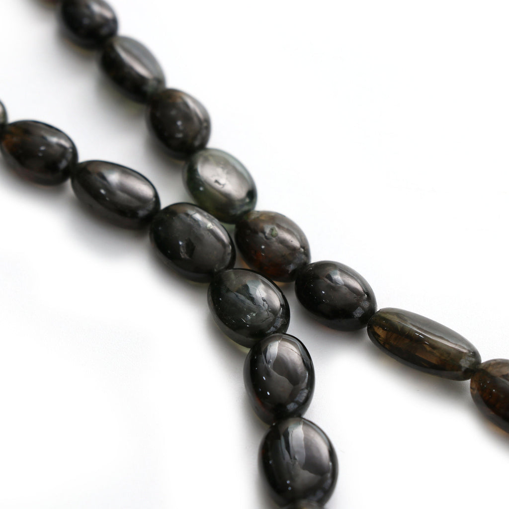 Natural Kornerupine Smooth Tumble Beads | Unique Kornerupine Tumble Beads | 6x7.5 mm to 10.5x17 mm | 8 Inch/ 18 Inch | Price Per Strand - National Facets, Gemstone Manufacturer, Natural Gemstones, Gemstone Beads