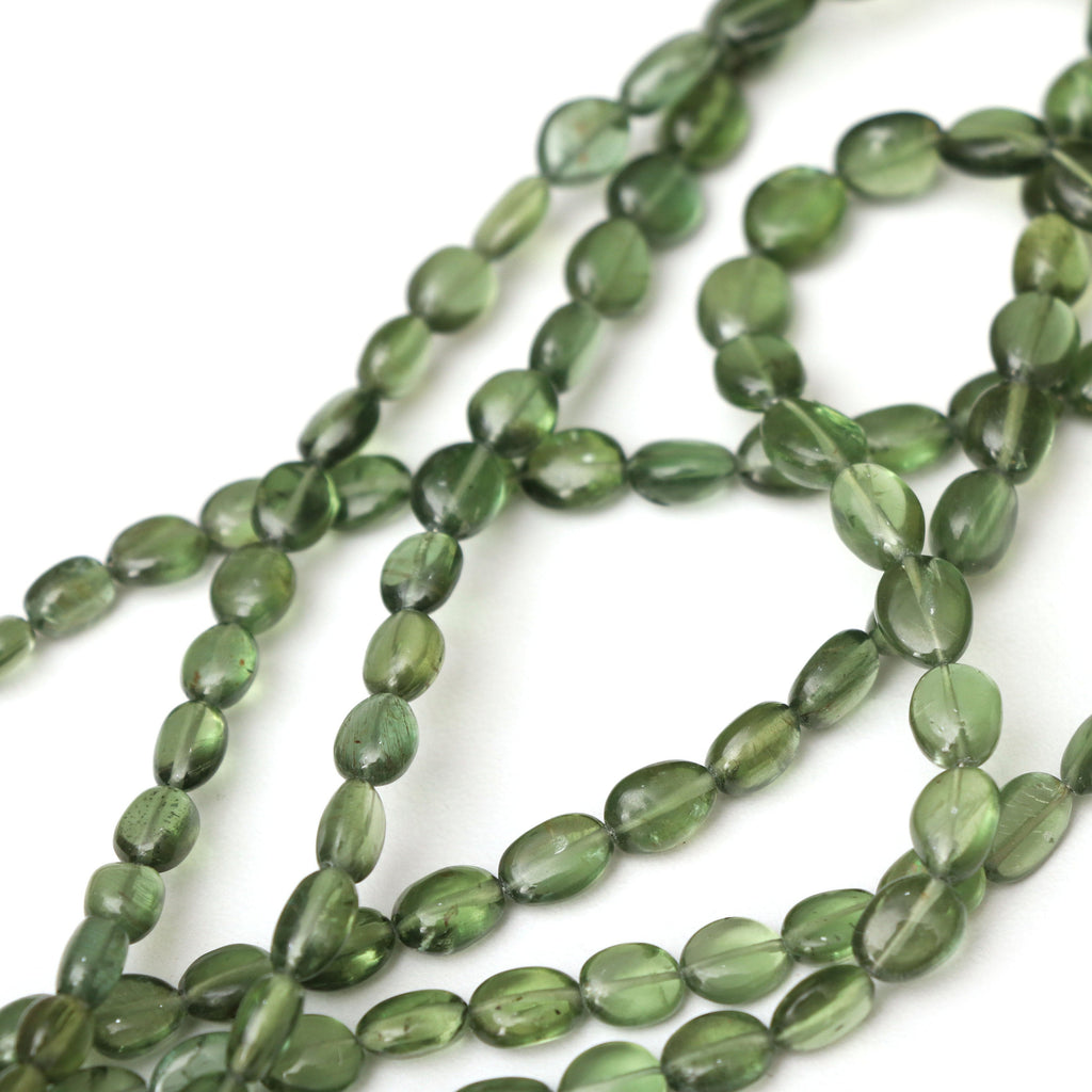 Olive Apatite Smooth Tumble 7x5 to 9x7mm | Natural Olive Apatite Beads For Making Jewelry | Olive Apatite Tumble, 15 Inch Strand, 80 cts - National Facets, Gemstone Manufacturer, Natural Gemstones, Gemstone Beads