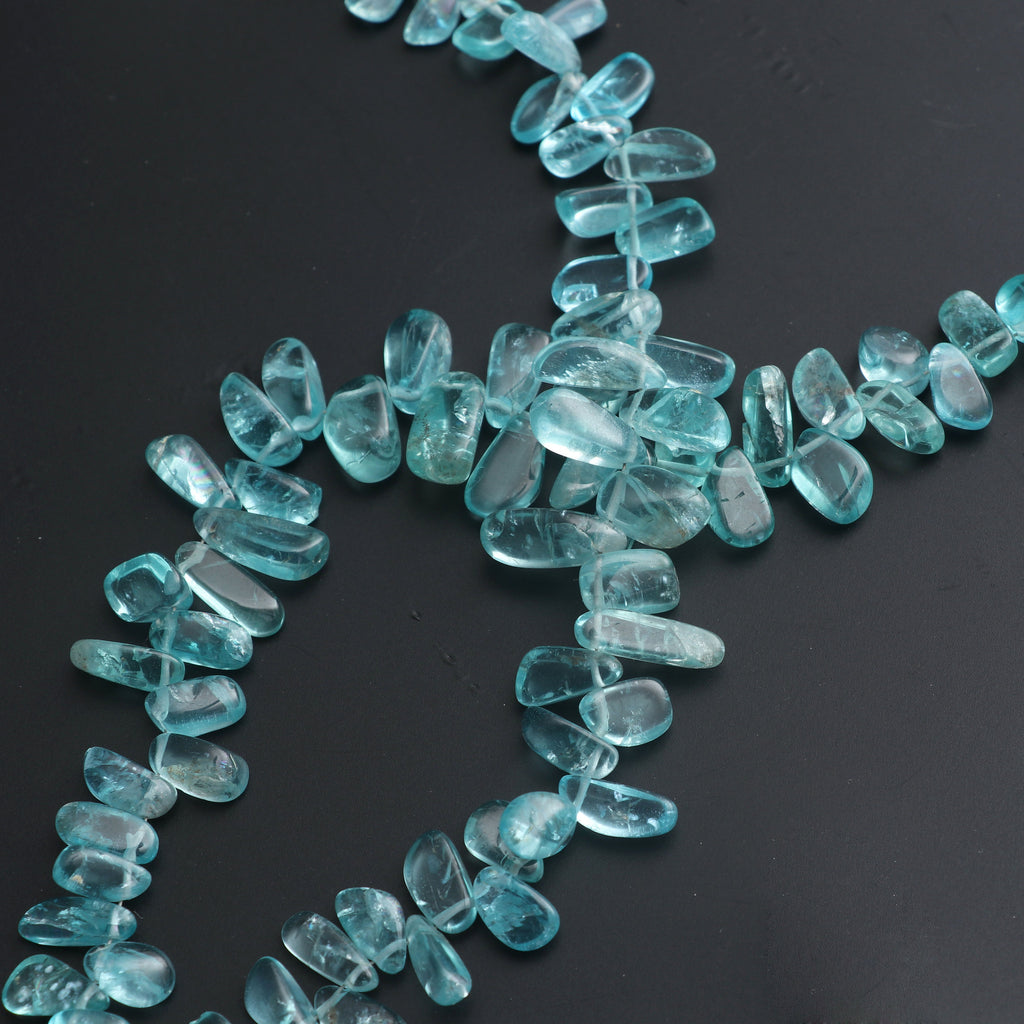 Sky Apatite Smooth Pabbles Beads - 5x8 mm to 8x14 mm - Sky Apatite Gemstone - Gem Quality , 18 Cm Full Strand, Price Per Strand - National Facets, Gemstone Manufacturer, Natural Gemstones, Gemstone Beads