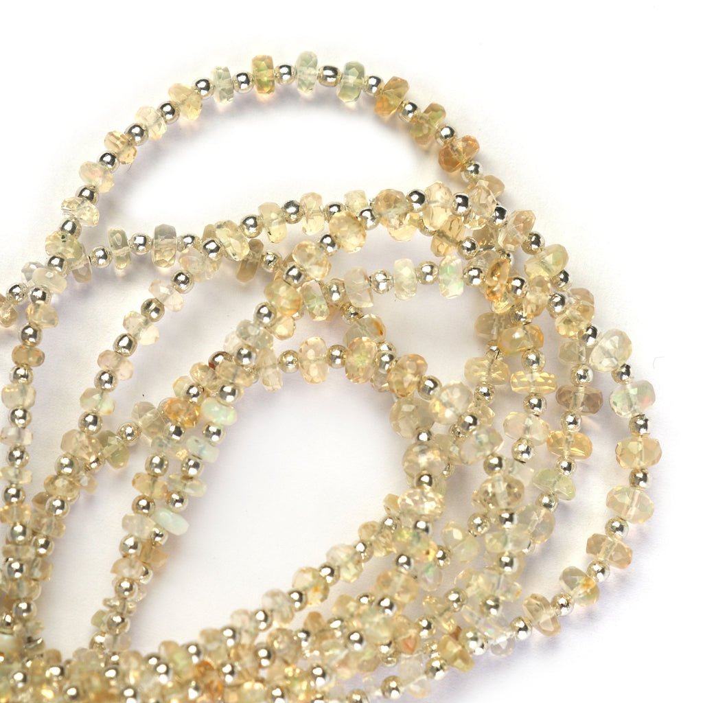 Ethiopian Opal Faceted Beads With Metal Spacer- 3mm to 5mm - Ethiopian Opal Beads - Gem Quality ,8 Inch/ 20 Cm Full Strand, Price Per Strand - National Facets, Gemstone Manufacturer, Natural Gemstones, Gemstone Beads